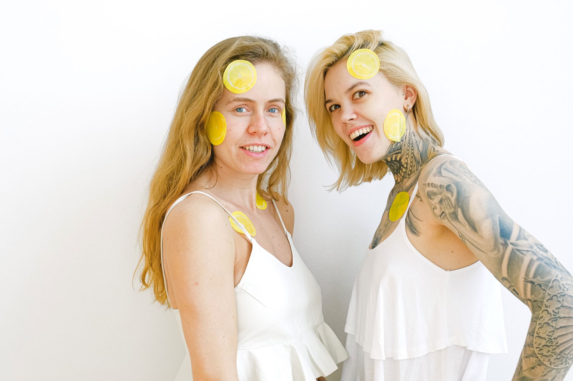 Vibrant yellow lemons on a bright studio background, symbolizing the warmth and ease of natural arousal